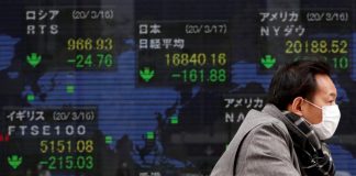Asian shares mixed, U.S. dollar near two-and-half-year lows