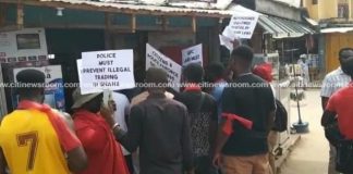 GUTA members demonstrate; lock up shops of foreign retailers in Koforidua